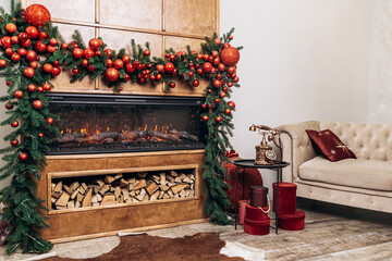 Cozy apartment, artificial electric bright fireplace with fake sparkling flame. Christmas Tree...