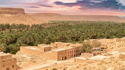 Foto op Plexiglas Erfoud town, nestled in the Tafilalet oasis, is a tranquil desert town surrounded by palm trees, Morocco © CanYalicn