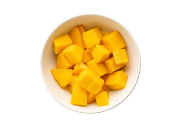 Top view of slices mango in a bowl isolated on white background