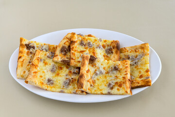 Kiymali pide.Turkish pide with minced meat. Turkish pizza mince pita Pide on white background. Etli ekmek. Kusbasi kasarli, kiymali kasarli, kiymali yumurtali,  tirnak Trabzon, Bafra, Kusbasili pide.