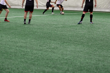 Obraz premium Futsal players rivals in action. Sport five a side concept.