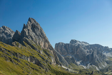Fototapeta na wymiar The world famous peaks of Seceda in the Italian Dolomites on a clear day.