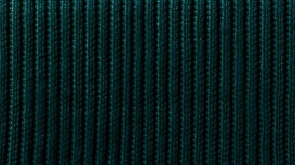 Background of a knitted Fabric Texture in dark green Colors. Close up