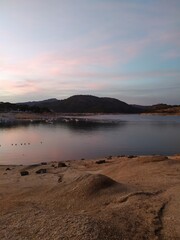 sunset over the lake swamp the rays of the sun.
