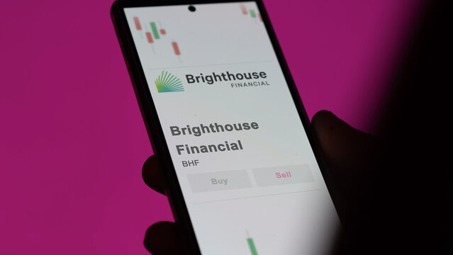 November 08th The logo of Brighthouse Financial on the screen of an exchange. Brighthouse price stocks, $BHF on a device.