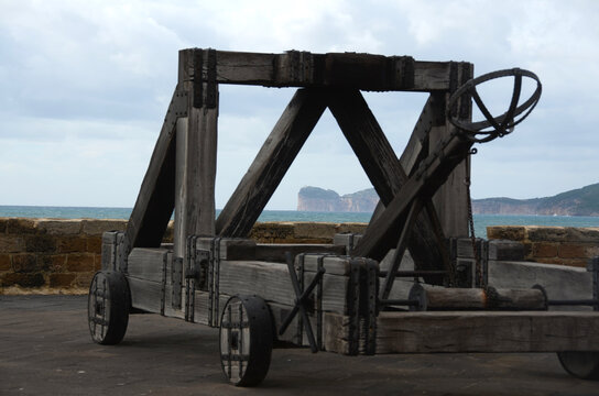 Catapult on seafront bastion in Alghero, Sardinia, Italy