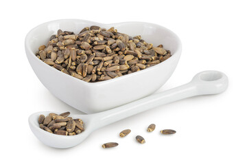 Seeds of a milk thistle or Silybum marianum, Scotch Thistle, Marian thistle in ceramic bowl isolated on white background