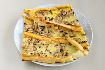 Kiymali pide.Turkish pide with minced meat. Turkish pizza mince pita Pide on white background. Etli ekmek. Kusbasi kasarli, kiymali kasarli, kiymali yumurtali,  tirnak Trabzon, Bafra, Kusbasili pide.