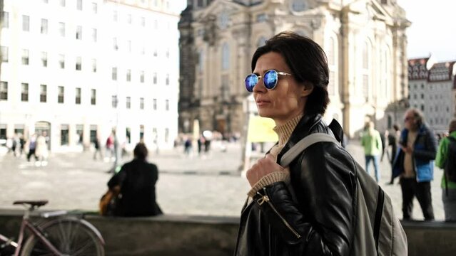 Attractive Woman Strolls Through Historical Center Of Dresden, Observing Sightseeing Spots