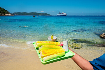 Cooked Corn being sold in Azeda Beach, or Bite Beach, Praia Azeda, a idilic beach with clear and...