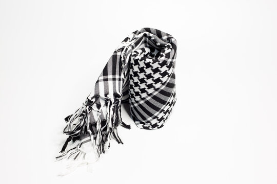 Keffiyeh, hijab, kandura or pushi, head covering commonly used in the Middle East and the Arab World. Keffiyeh is a traditional garment tied to the head.