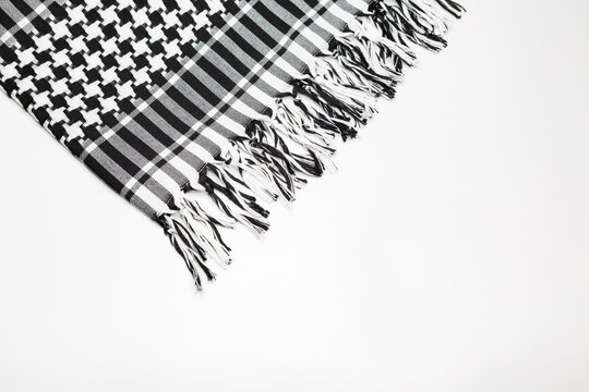 Keffiyeh or Pushi, head covering commonly used in the Middle East and the Arab World. Keffiyeh is a traditional garment tied to the head.