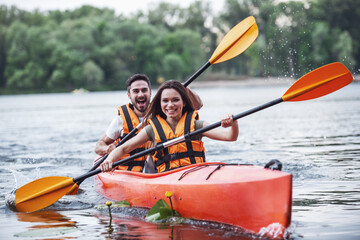 Couple travelling by kayak