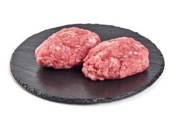 Minced meat patties, isolated on white background.