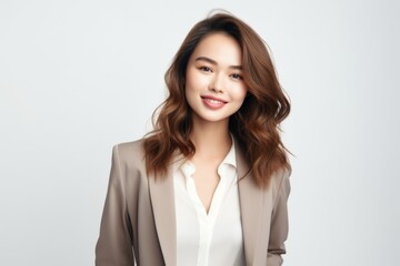 Young attractive woman dressed in business style. Successful business woman, employee, manager.
