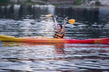 Woman and kayak