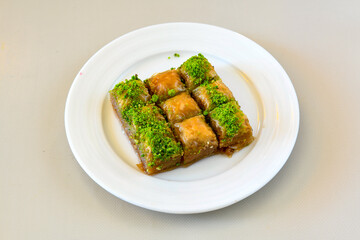 Turkish Dessert Sobiyet  Baklava, mussels baklava and classic baklava with Pistachio . Cevizli, Fistikli Baklava, top view.