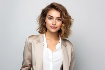 Fototapeta premium Young attractive woman dressed in business style. Successful business woman, employee, manager.