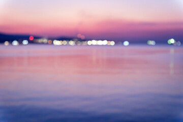 Abstract blurred seaside sunrise vibes bg, pink, purple and blue bokeh background