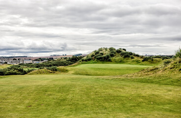Fototapeta premium St Andrews, Scotland - September 22, 2023: Landscape views of the Jubilee Golf Course, a public course in St Andrews Scotland 