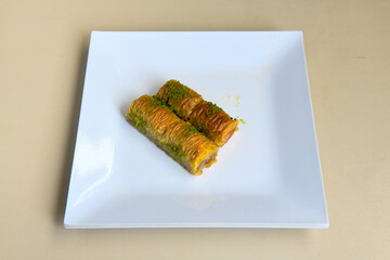 Turkish Dessert Sobiyet  Baklava, mussels baklava and classic baklava with Pistachio . Cevizli, Fistikli Baklava, top view.