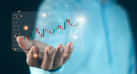 Planning and strategy concept, stock market, trader or investor working at home. Technical price graph and indicator, red and candlestick chart and stock trading screen.