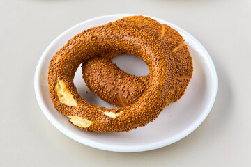 Turkish pastry product , tasty pogaca. Simit, gevrek. Turkish Pastries; peynirli, patatesli, kasarli pogaca, borek, acma, ay coregi at patisserie showcase.