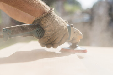 Grinding of an oak board with an angle grinder