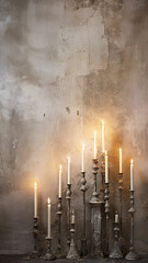 vertical christmas decorations burning candles  high form, abstract background copy space, empty blank wall background, on concrete wall