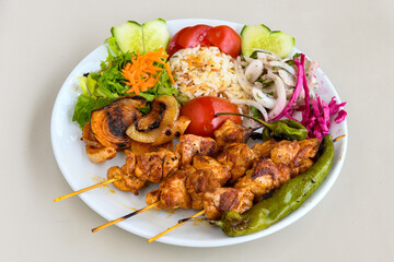 Chicken wings barbeque in a dish with BBQ grill sauce . Izgara tavuk kelebek sis kanat. Tavuk sis, gogus.