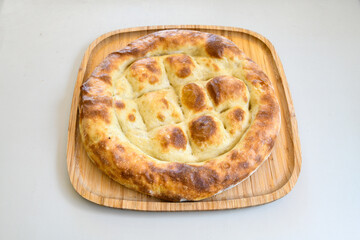Kiymali pide. Turkish pide with minced meat. Turkish pizza mince pita Pide on white background. Etli ekmek. Kusbasi kasarli, kiymali kasarli, kiymali yumurtali, Trabzon, Bafra, Kusbasili pide.