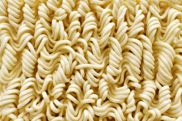 Uncooked instant noodles texture background.