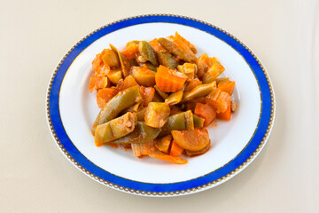 Sauteed chicken with carrots and peas ( Turkish ; Et, Tavuk Sote, guvec  )