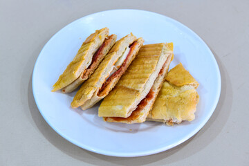 Turkish karisik atom  tost ( kasarli bazlama tost) . Sucuklu, Kasarli, kavurmali karisik tost. Flat baked bread toasted