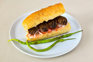 Meatball between bread (Turkish name : ekmek arasi kofte ). Izgara kofte