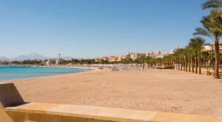 panorama of Sahl Hasheesh in Egypt for summer background with sea, beach, sun and palm trees