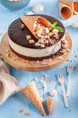 Delicious cookie cake made of brownie, whipped cream and glaze.