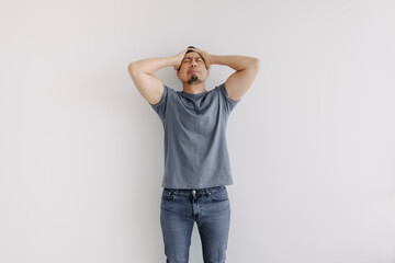 Unpleasant feeling emotion of asian man isolated on white. Depressed and Stress.