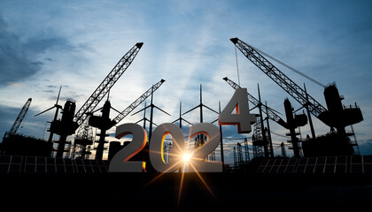 2024 focus of energy concept.Silhouette of powerplant,solar cell plant and wind generators to...
