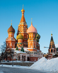 Fototapeta na wymiar Famous nine domed Saint Basils Cathedral or Pokrovsky Cathedral on Red Square in Moscow on sunny winter day. Popular cultural symbols of Russia