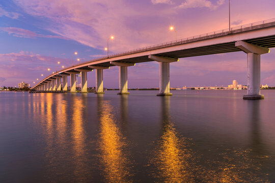 Sand Key Bridge - A panoramic dusk view of Sand Key Bridge, a girder bridge connecting Clearwater and Belleair Beach over the Clearwater Pass, Florida, USA.