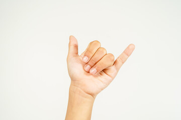 Obraz premium child hand pointing with two fingers, hand showing peace sign isolated on white background