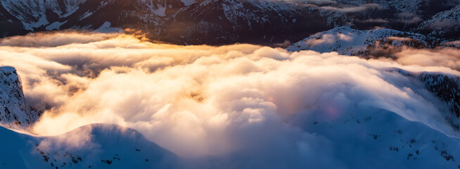 Snow covered Mountain Peak. Canadian Nature Aerial Background.