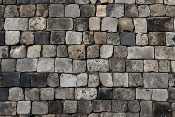 Obraz premium Road surface texture, closeup of stone bricks material