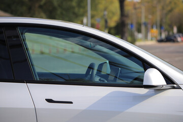 Front glass of a white car door