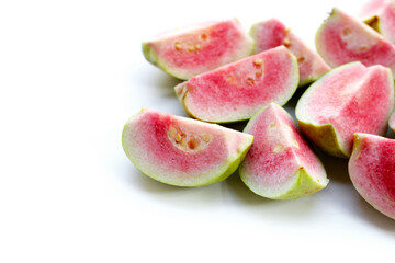 Fresh pink guava on white background.