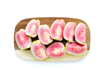 Fresh pink guava on white background.