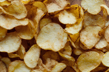 An assortment of potato chips in colorful packaging, offering a variety of flavors to satisfy your snack cravings.
