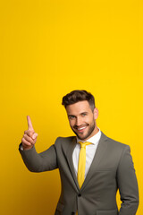 businessman pointing up at empty space for advertising.