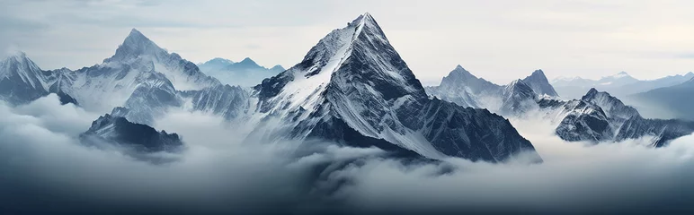 Papier Peint photo Gris foncé panorama landscape of mountains snowy peaks of rocks in fog and clouds.
